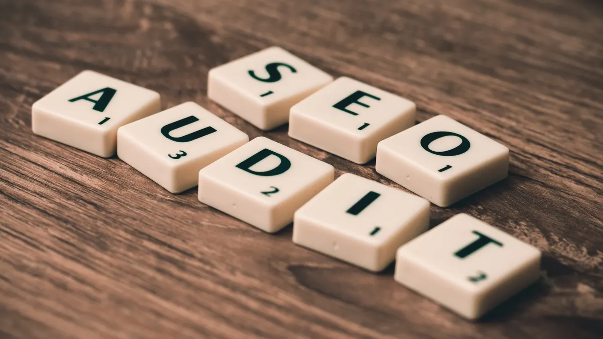 AI SEO strategy for small business owners — The Complete Guide — Seo Audit White Blocks on Brown Wooden Surface