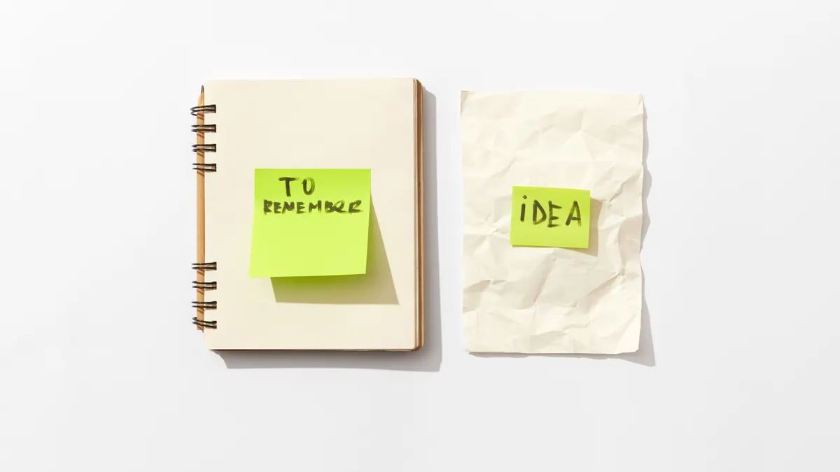 Notebook with notes saying TO REMEMBER and IDEA