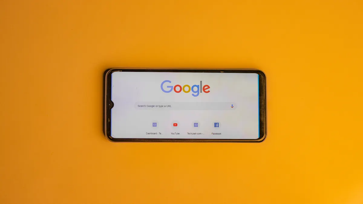 How to fix common local SEO problems in Google search results — Smart Phone with a Google Search Page on its Display
