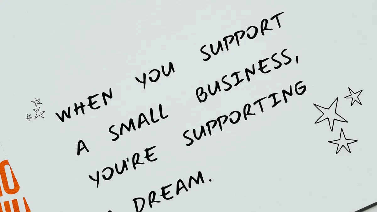 How to get more local reviews for a small business — Small Business Related Marketing Slogan on Paper