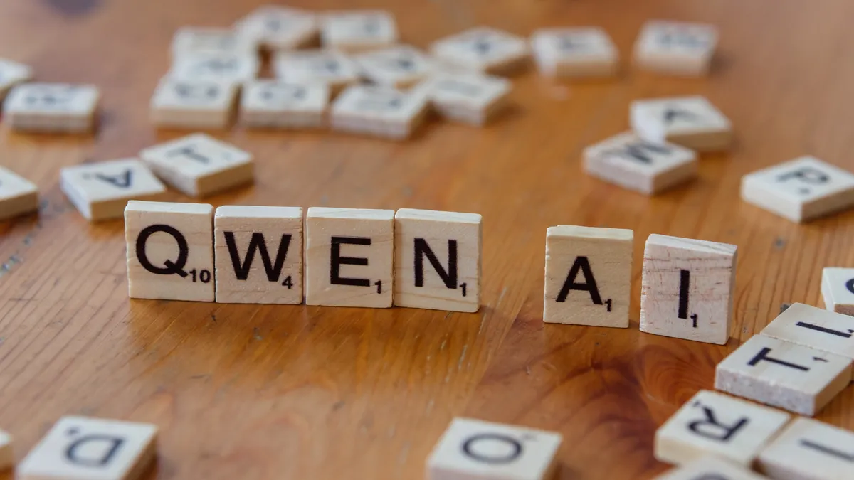 How to use AI for keyword clustering on a small business site How to use AI for keyword clustering on a small business site — Wooden Letter Tiles Spelling 'Qwen AI' on Table